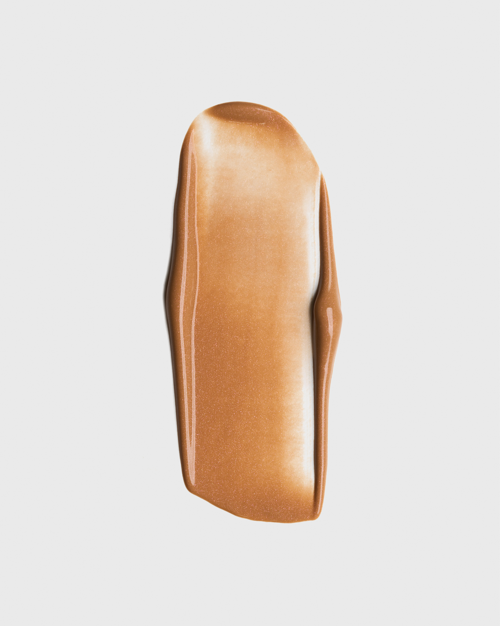 Facial serum texture swatch in golden neutral shade