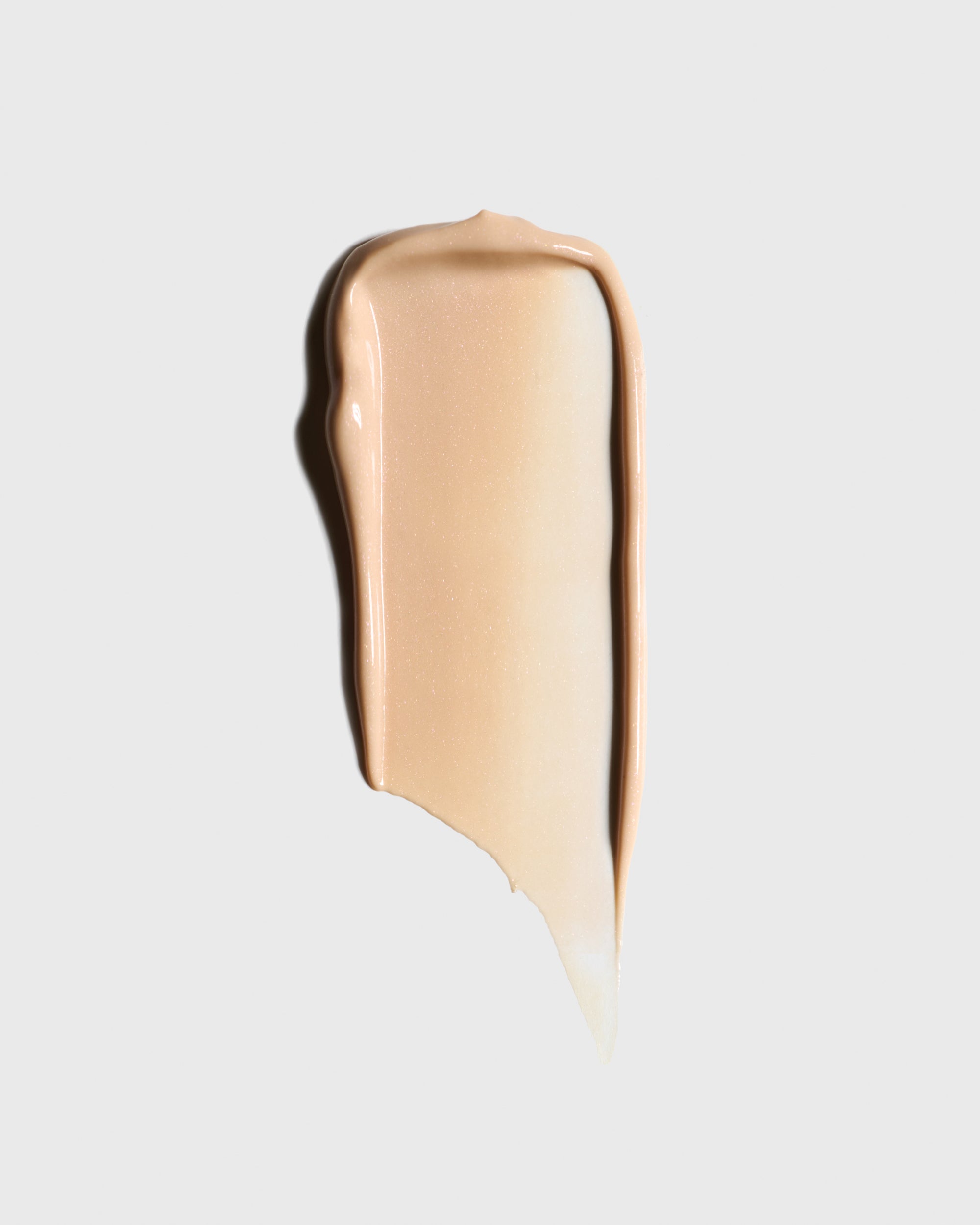 Beige tinted swatch of Dr. Marnie's Facial Serum in Radiant Neutral shade