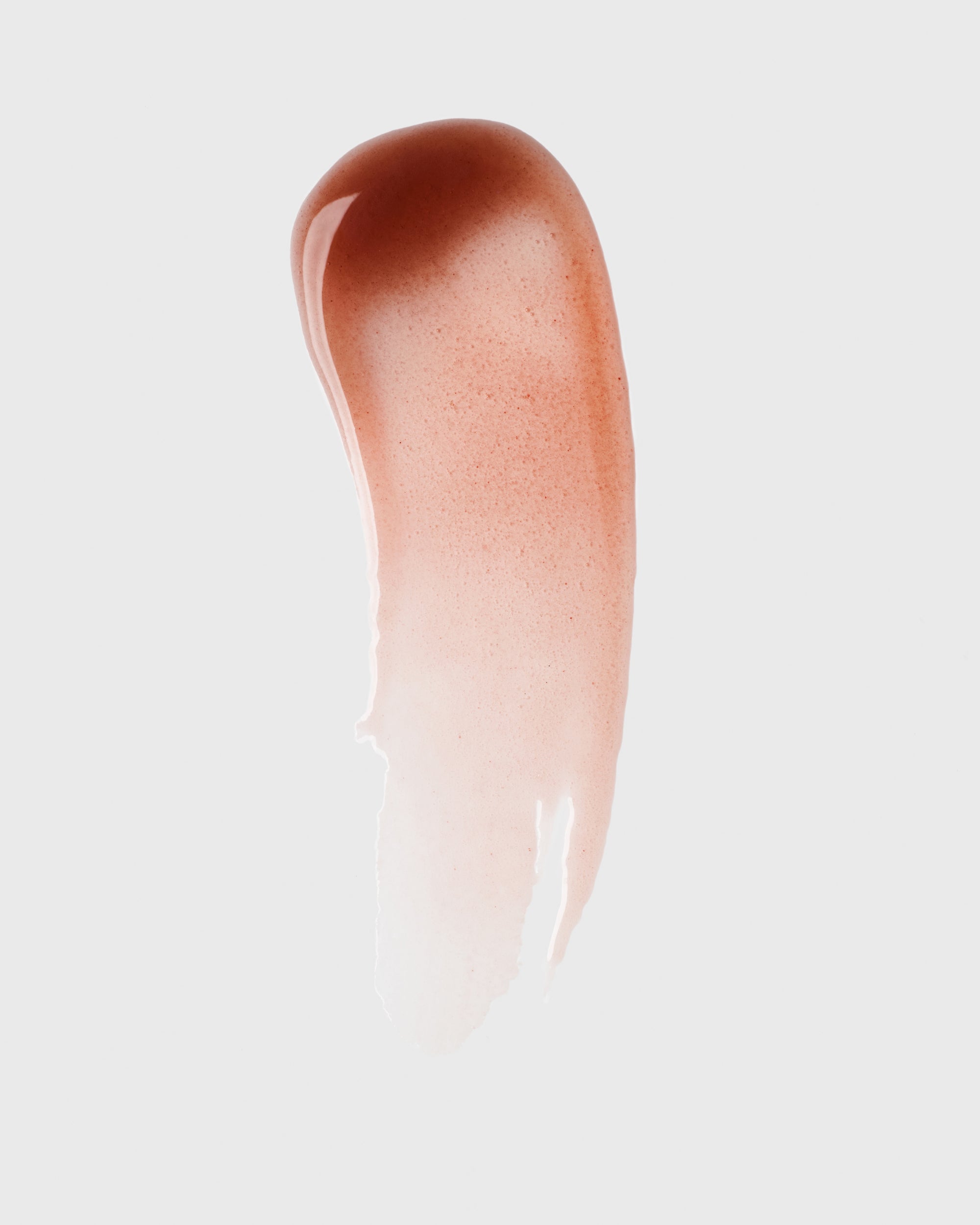 Berry tinted swatch of Dr. Marnie's Lip Serum in deep Berry shade