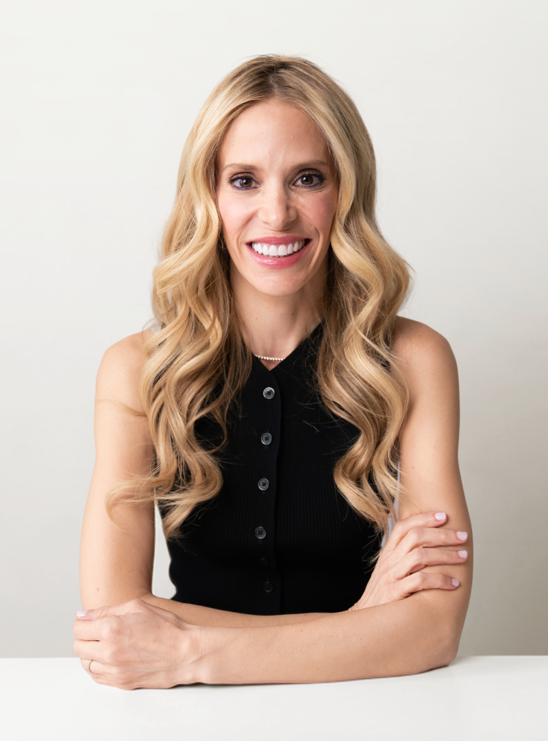 Portrait of Dr. Marnie Nessler, board-certified dermatologist and founder of the Dr. Marnie skincare line.