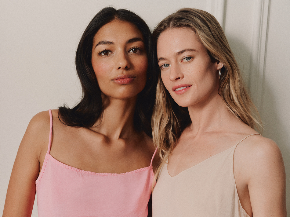 Two models with smooth, glowing complexions — results of Dr. Marnie skincare routine.