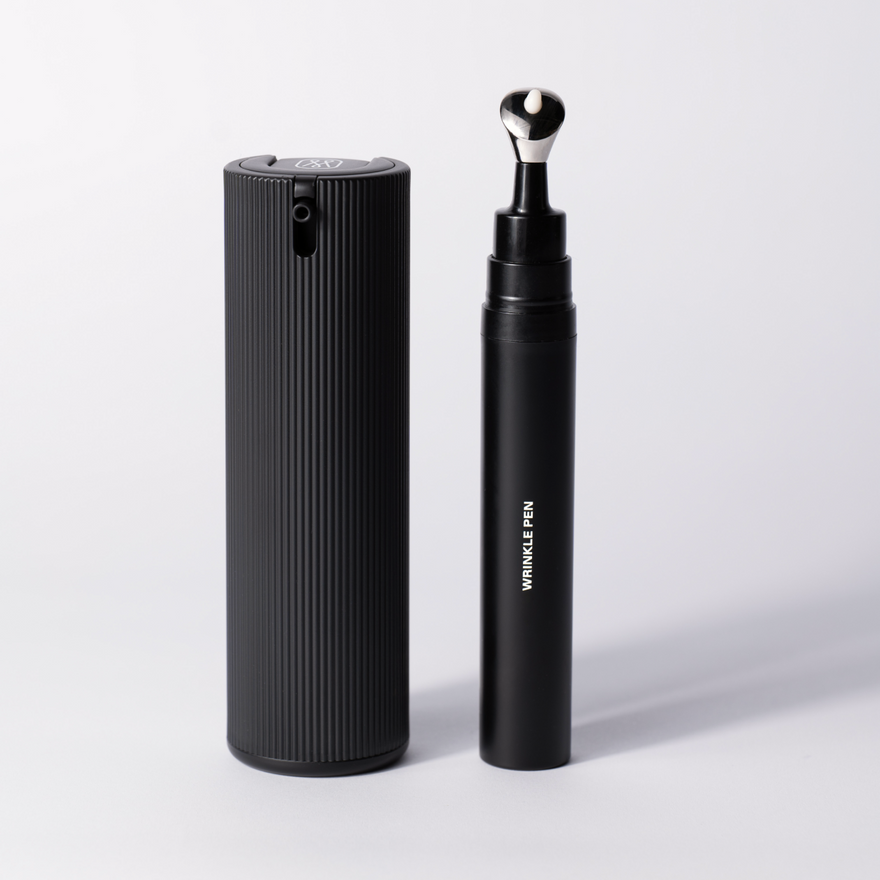 Packshot of the Smooth & Firm Duo: the ribbed Facial Serum bottle beside the Wrinkle Pen.