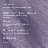 A five-ingredient list in white type over a purple botanical petal texture background