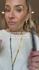 Emese talking to camera holding the Wrinkle Pen — creator video