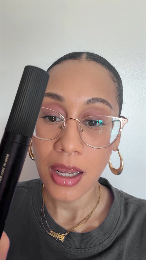 Shari holding the Wrinkle Pen beside her face